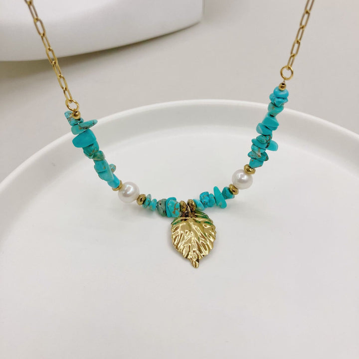 Collana con ciondolo con foglie turchesi irregolari naturali Olivenorma