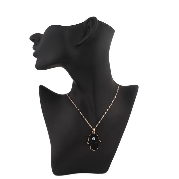 Collana di cristallo trasparente di ossidiana con occhio maligno di Hamsa Olivenorma