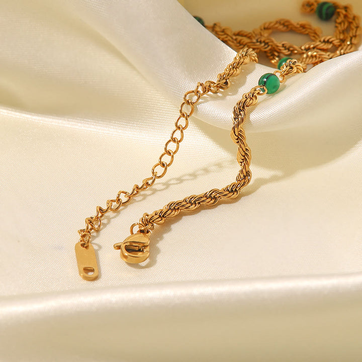 Collana con clavicola intrecciata in perline di malachite naturale Olivenorma 