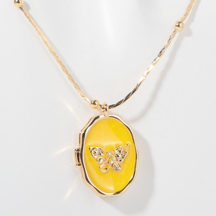 Collana con pendente a farfalla in madreperla Olivenorma in rame placcato oro 14k 