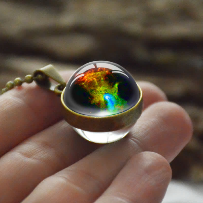 Collana creativa con sfera di vetro e luna e stella