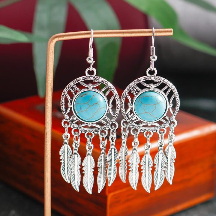 Olivenorma Boho Orecchini con nappe di piume turchesi - image 1