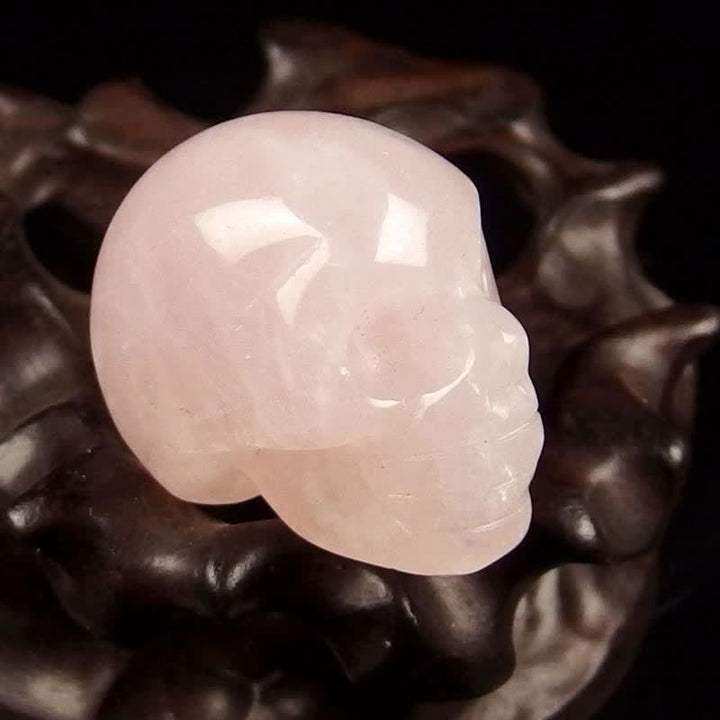 Decorazione teschio di cristallo di quarzo rosa