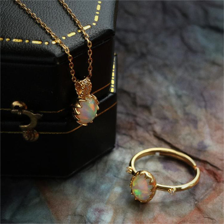 Collana con anello dorato giallo opale Olivenorma