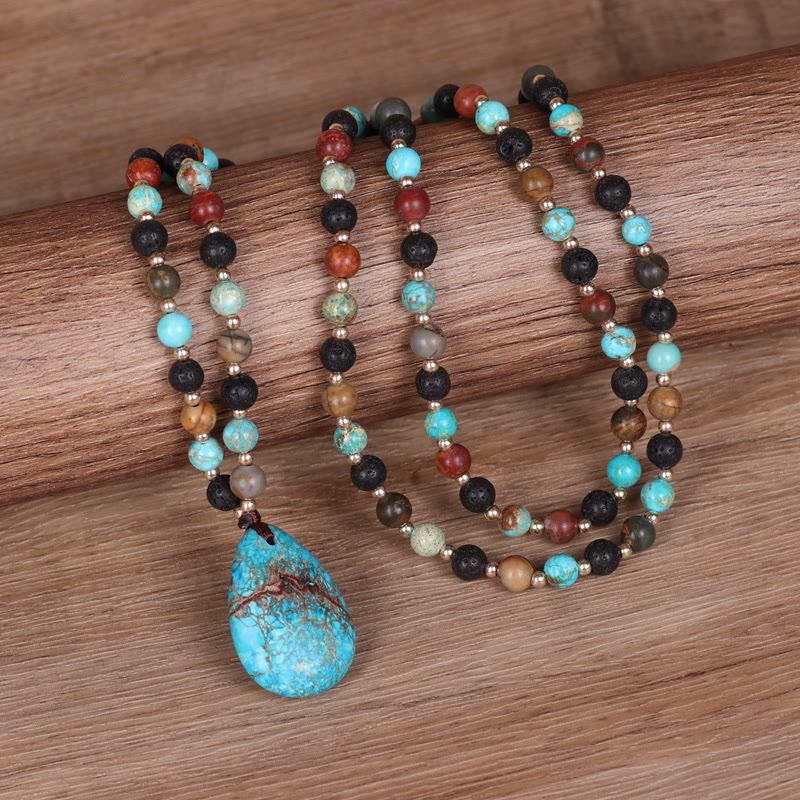Collana di perline Mala con ciondolo a forma di goccia turchese Olivenorma