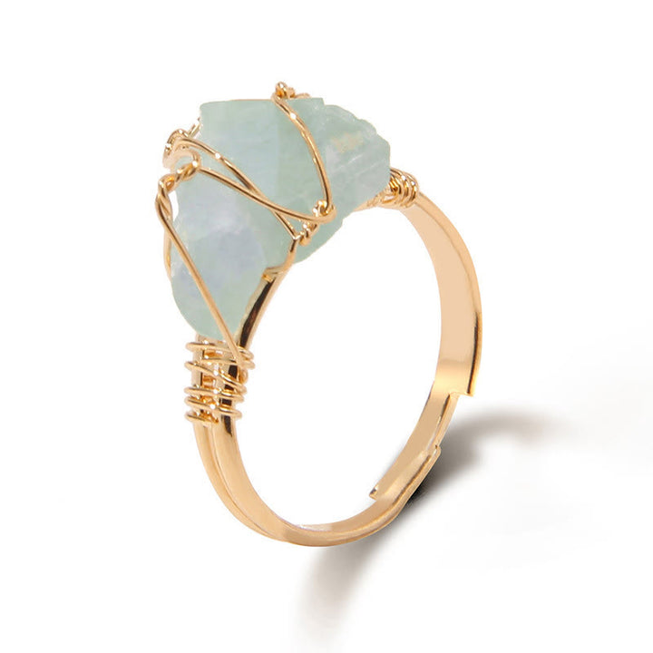 Anello con pietra preziosa naturale irregolare e ruvida Olivenorma