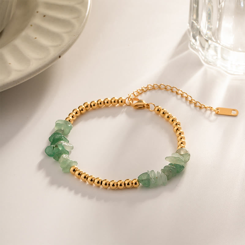 Bracciale Olivenorma con perline dorate in cristalli naturali frantumati