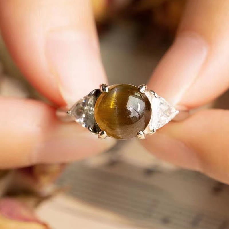 Anello Olivenorma con pietra occhio di gatto verde dorato a quattro artigli