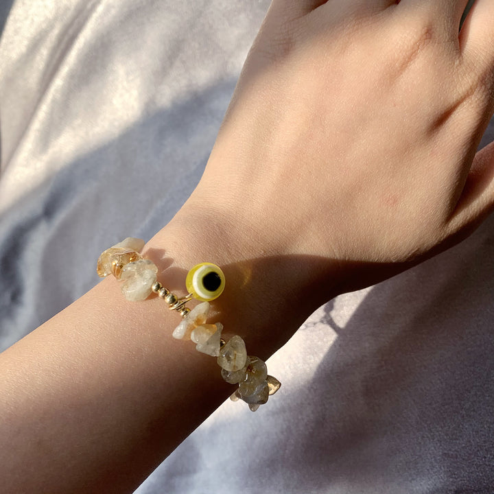 Braccialetto con ciondolo in ghiaia di cristallo naturale Olivenorma contro il malocchio 