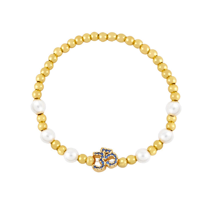 Bracciale Olivenorma in ottone con perle e simbolo Om
