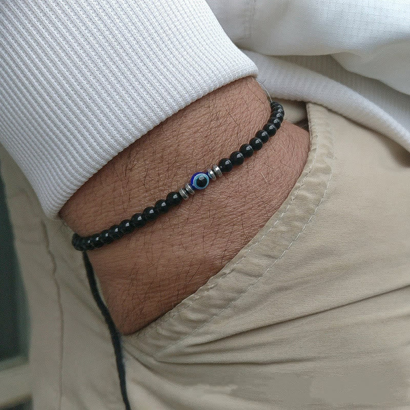 Olivenorma Braccialetto da uomo con perline in pietra naturale da 4 mm contro il malocchio