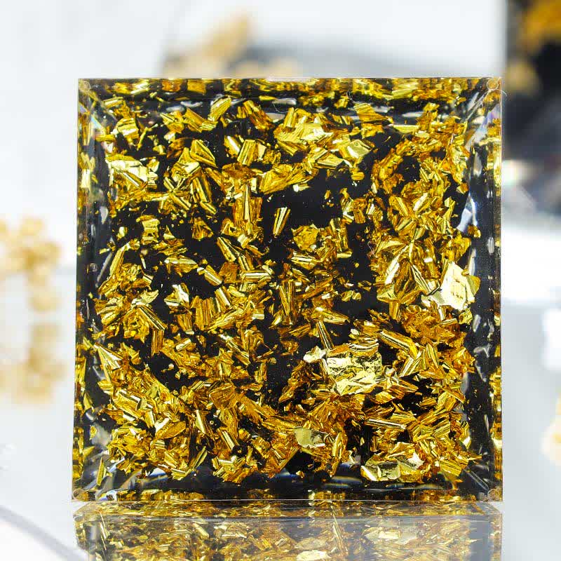 Olivenorma "Luce nell'oscurità" - Piramide di orgone di loto in onice nero