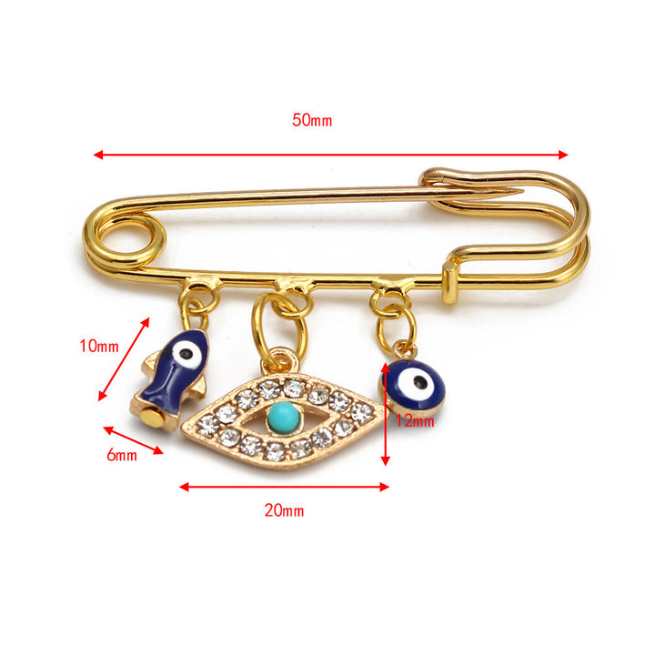 Spilla serie Hamsa con occhio malvagio Olivenorma