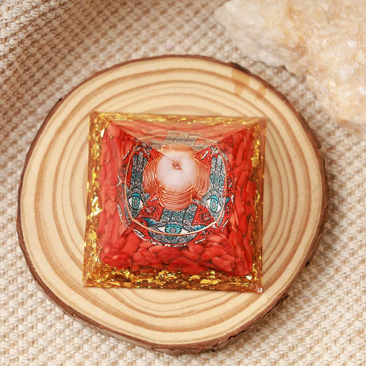 Olivenorma Opale con Corallo Rosso Hamsa Orgone Piramide 