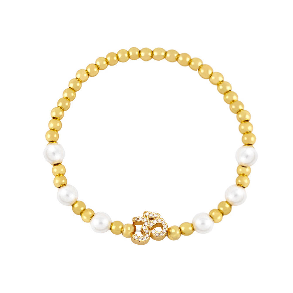 Bracciale Olivenorma in ottone con perle e simbolo Om