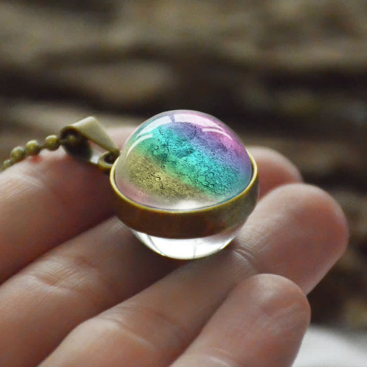 Collana creativa con sfera di vetro e luna e stella