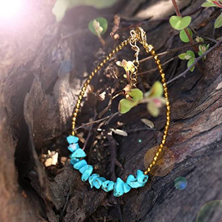 Bracciale Olivenorma con catena in oro e perline turchesi 