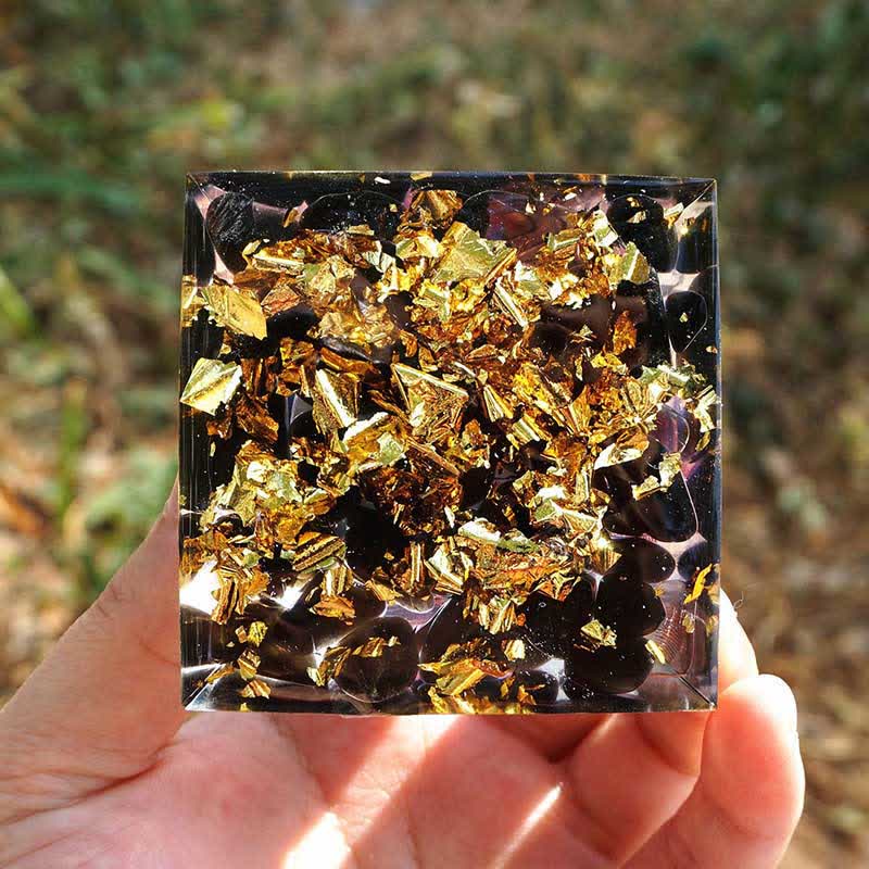 Sfera di lapislazzuli Olivenorma con piramide di orgone di ossidiana 