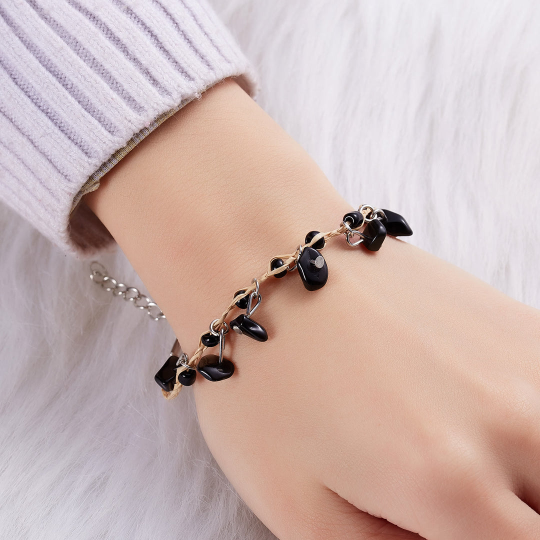 Bracciale intrecciato con ghiaia, nappa, ossidiana, occhio di tigre e ametista Olivenorma