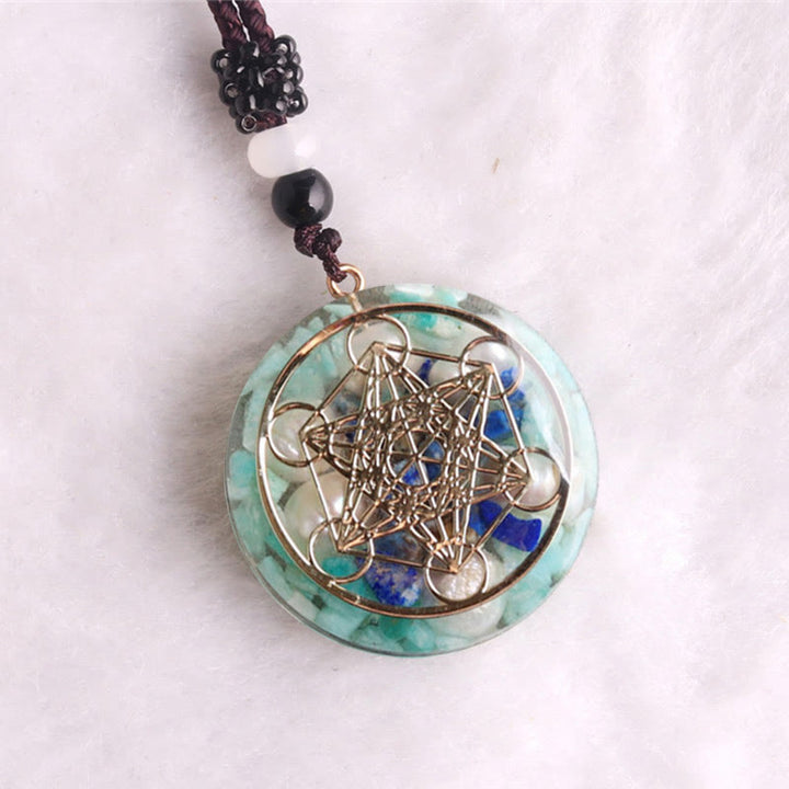 Collana con ciondolo in perla di lapislazzuli e cubo di Metatron in amazzonite Olivenorma