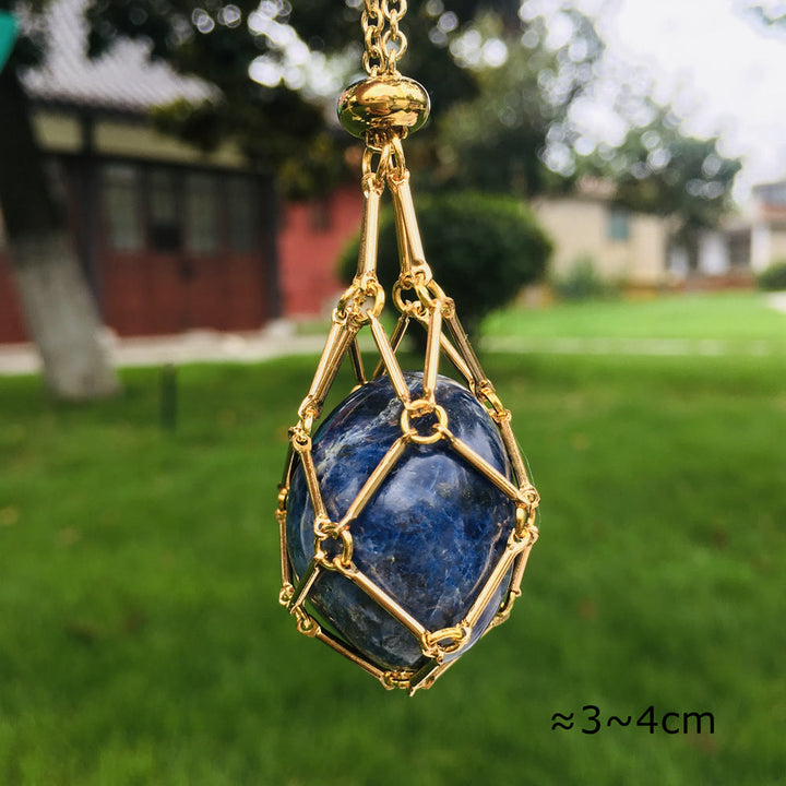 Collana con ciondolo in pietra grezza di cristallo Olivenorma e rete metallica in pietra 