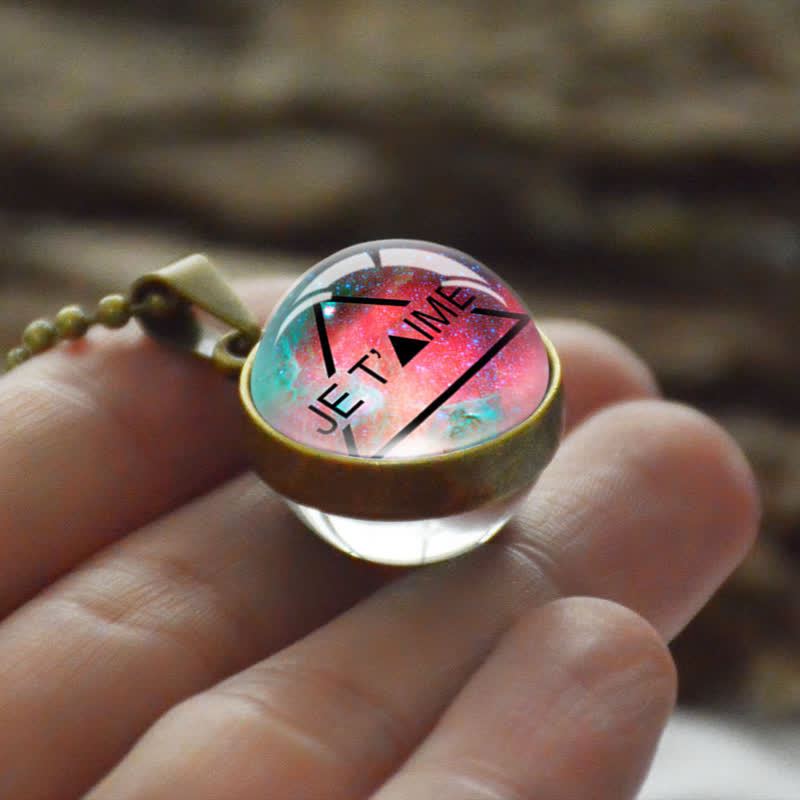 Collana creativa con sfera di vetro e luna e stella