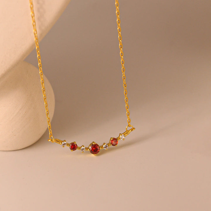 Collana Olivenorma "Simbolo dell'Indipendenza" con granato e diamanti