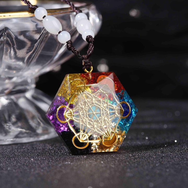 Collana di meditazione con simbolo del cubo di Metatron e chakra di Olivenorma