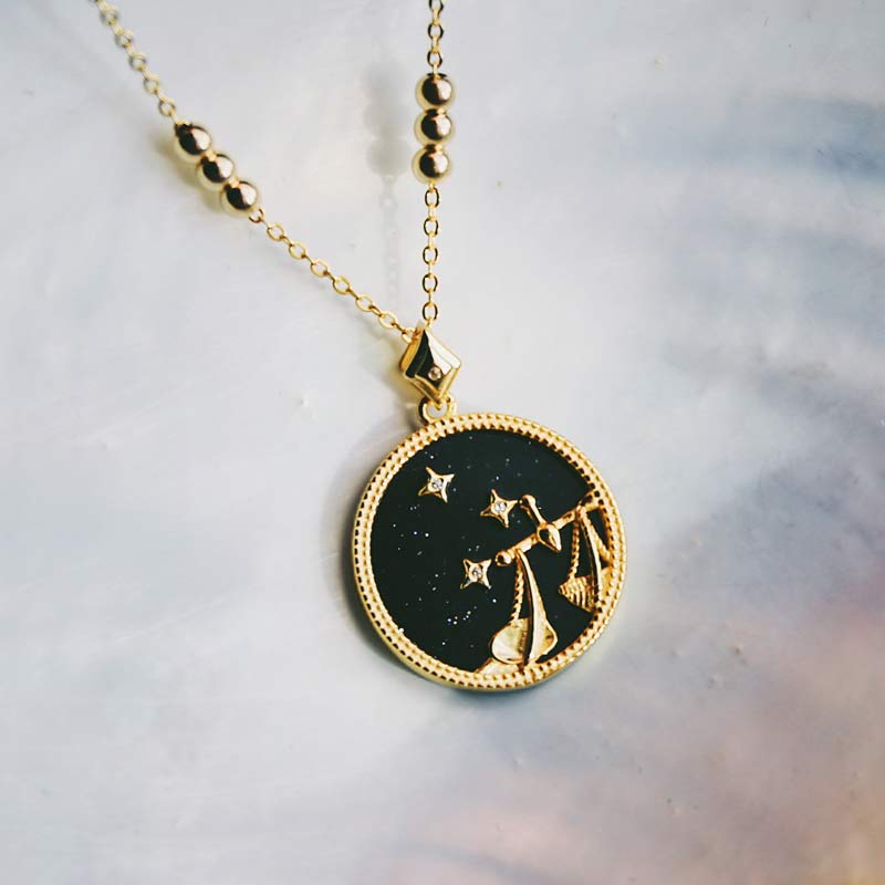 Collana Zodiaco in ascolto in arenaria blu 