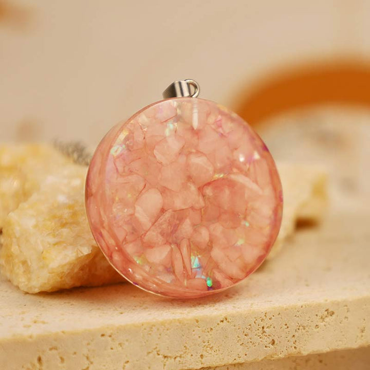 Collana Reki con fiore di quarzo rosa della vita