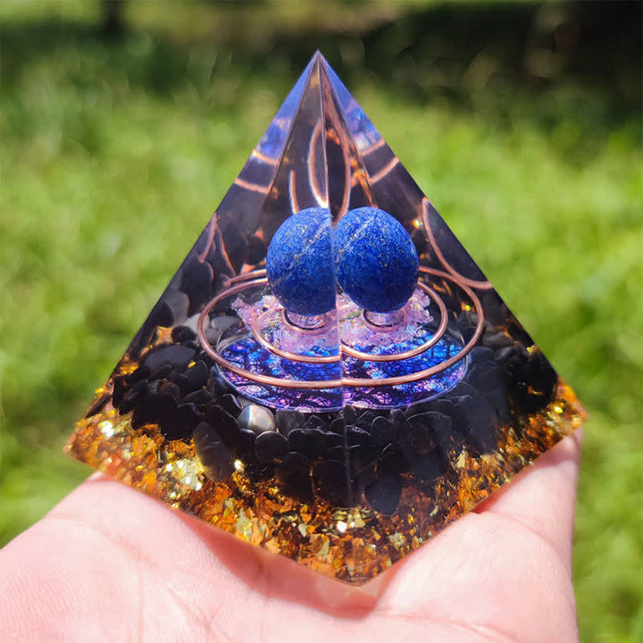 Sfera di lapislazzuli Olivenorma con piramide di orgone di ossidiana 