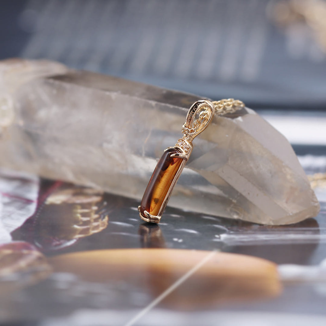 Collana con ciondolo ad anello in ambra artificiale Olivenorma 
