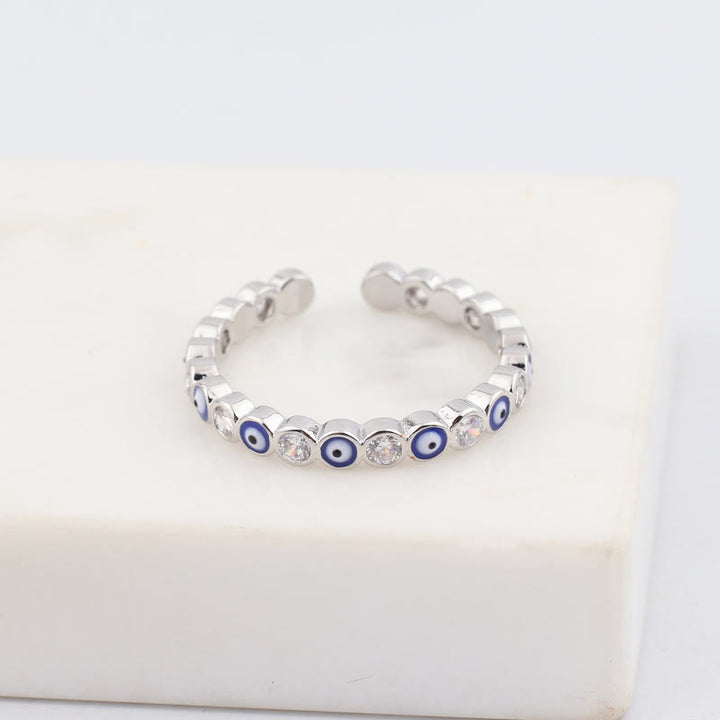 Olivenorma Anello regolabile con zircone bianco e colorato malocchio 