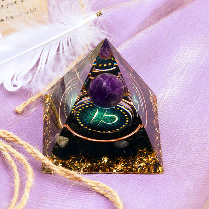 Sfera di ametista Olivenorma con piramide di orgone dello zodiaco Bilancia in ossidiana 