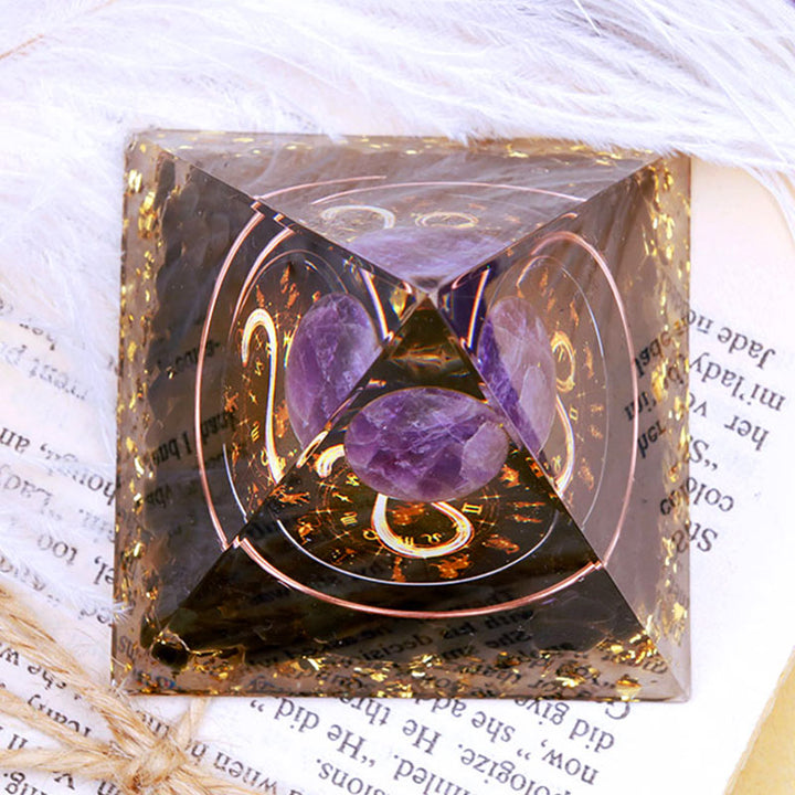 Sfera di ametista Olivenorma con piramide di orgone dello zodiaco Leone in ossidiana 
