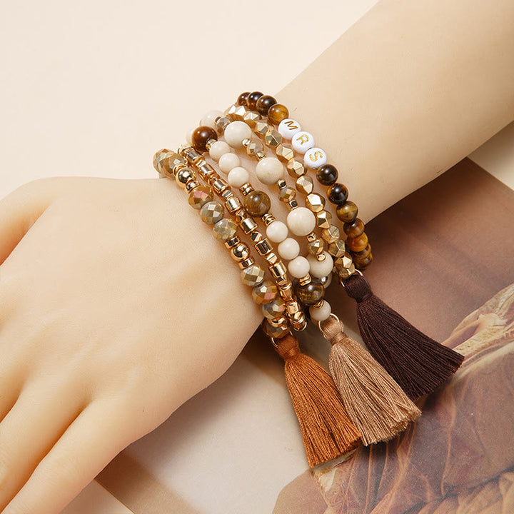 Olivenorma Set di 6 bracciali in cristallo naturale inciso