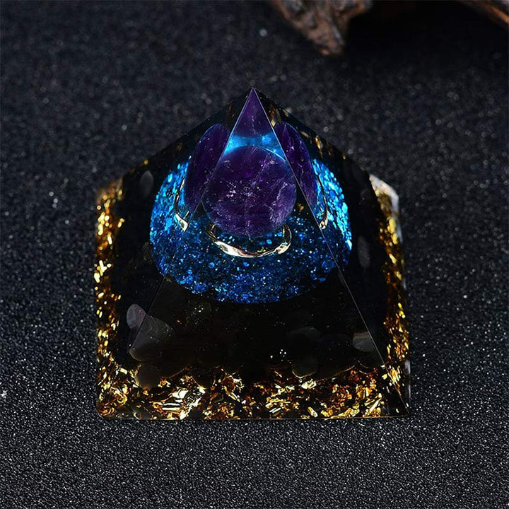 Sfera di ametista Olivenorma con piramide di quarzo blu Reki Orgone 