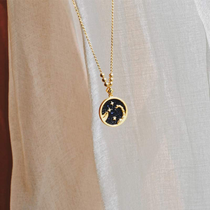 Collana Zodiaco in ascolto in arenaria blu 