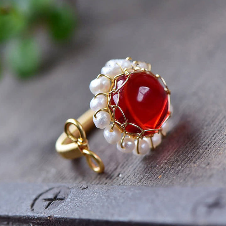 Anello di guarigione in quarzo rosso con perla