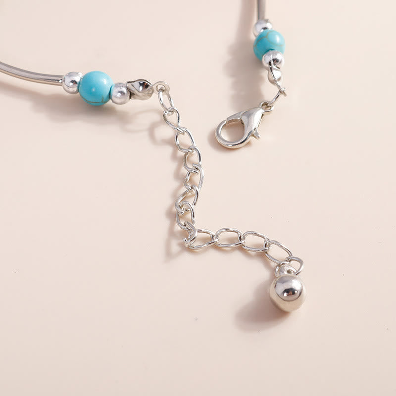 Bracciale con ciondolo a croce con perline turchesi Olivenorma