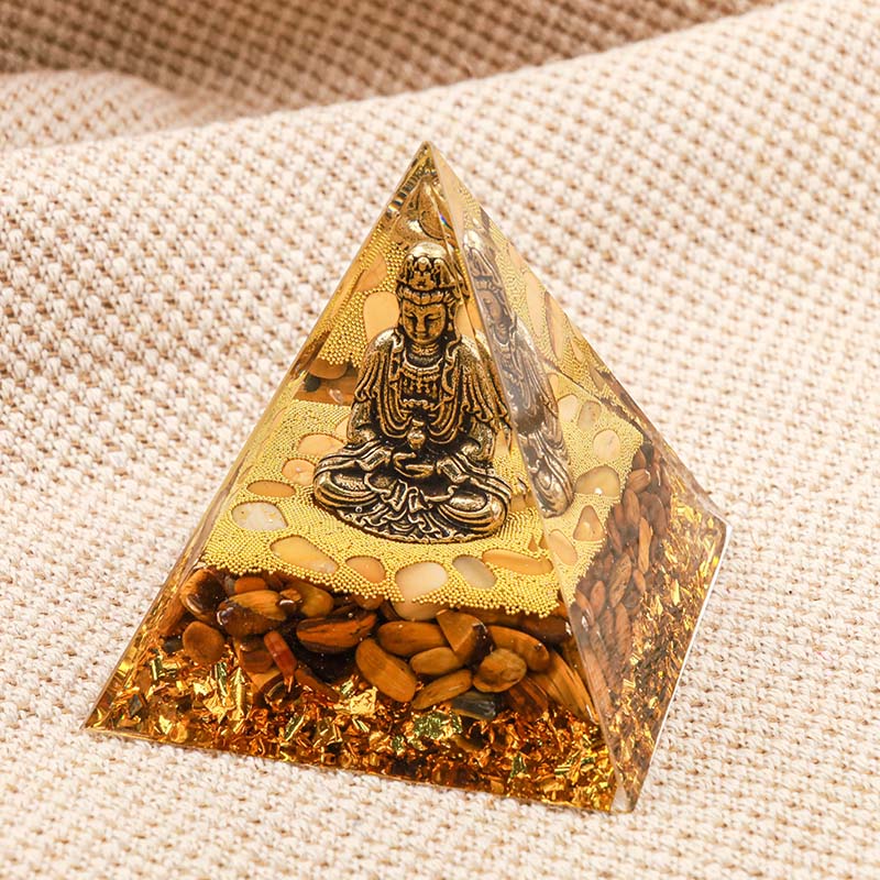 Buddha Olivenorma con piramide di orgone con protezione dell'occhio di tigre
