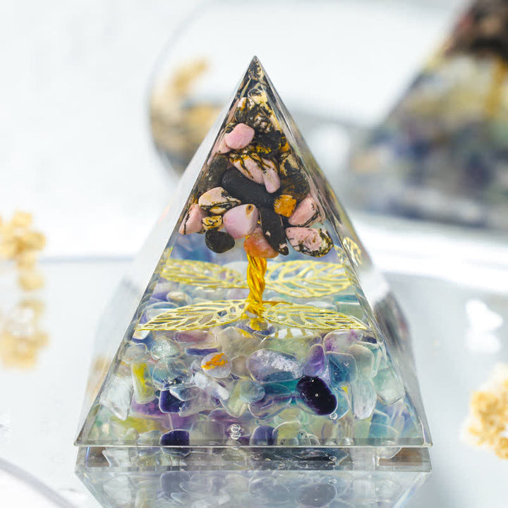 Olivenorma Rhodonite con piramide di orgone di crescita di fluorite