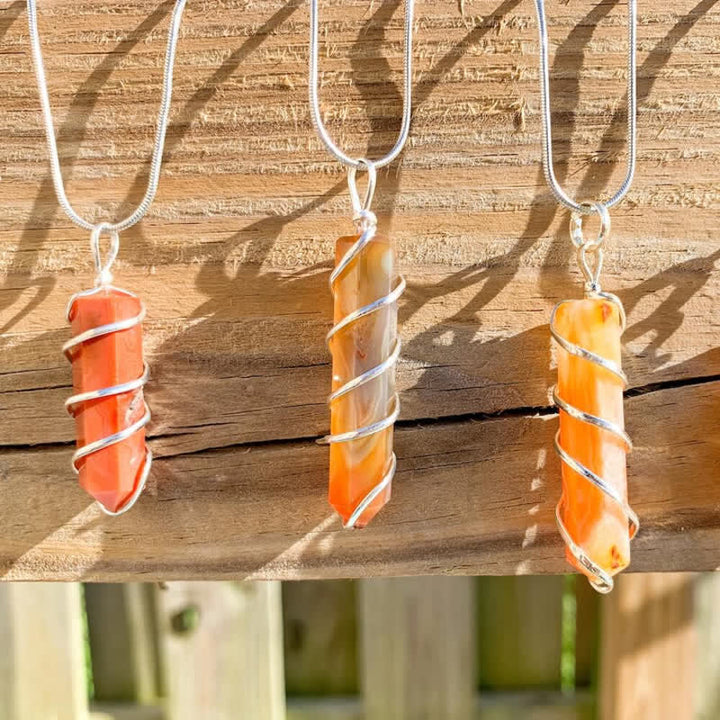 Collana di cristallo con testa di proiettile esagonale a forma di corniola Olivenorma
