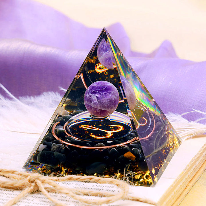 Sfera di ametista Olivenorma con piramide di orgone dello zodiaco Ariete in ossidiana 