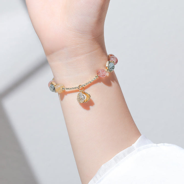 Bracciale con ciondolo a conchiglia in quarzo rutilato colorato Olivenorma 