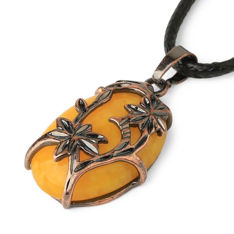 Collana con fiore in ottone e ametista Olivenorma avvolto in cristallo