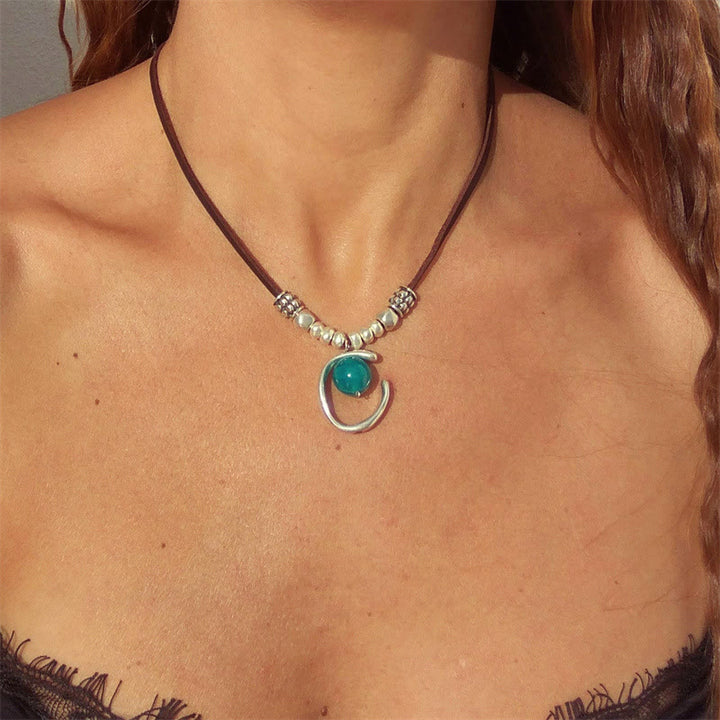 Collana in corda di pelle con ciondolo a mezzo anello in acquamarina Olivenorma 