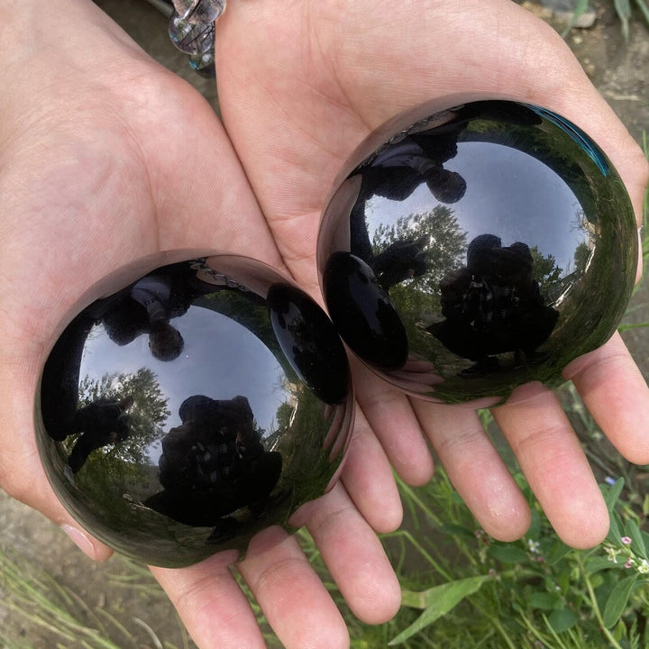 Decorazione una sfera di cristallo di ossidiana Olivenorma