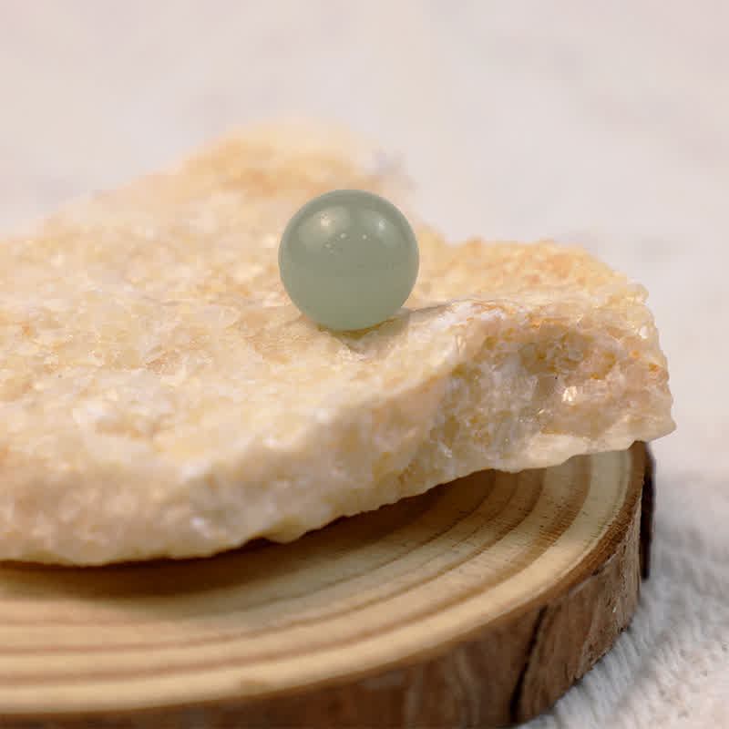 Sfera di cristallo della prosperità in avventurina verde Olivenorma