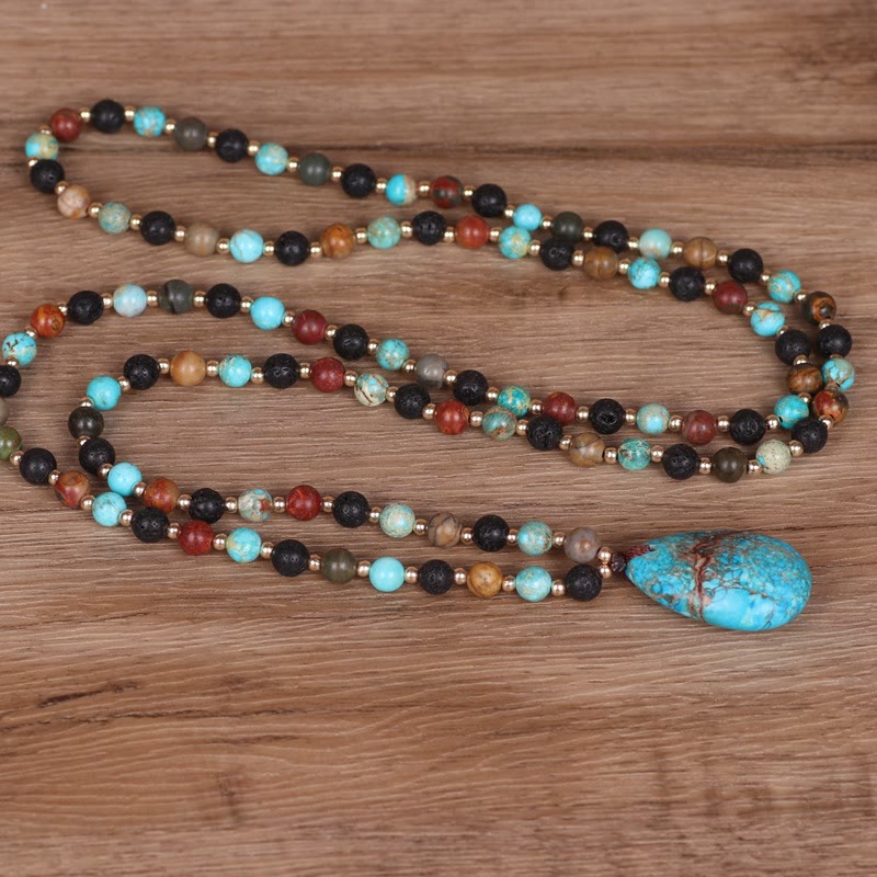 Collana di perline Mala con ciondolo a forma di goccia turchese Olivenorma